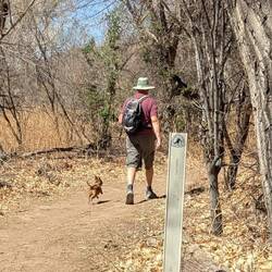 June and his dog Lucy. She likes to hunt for mice and lizards