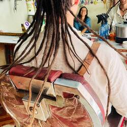 dreads getting a perfect fitting before leaving