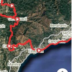 You can really see the red color of the rocks in the Sierra Bermeja in this satellite view.