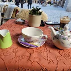 Teapot fits over the teacup