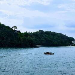 A local boat going by as we depart Phuket.