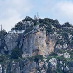 Cave with the chapel on top of the hill