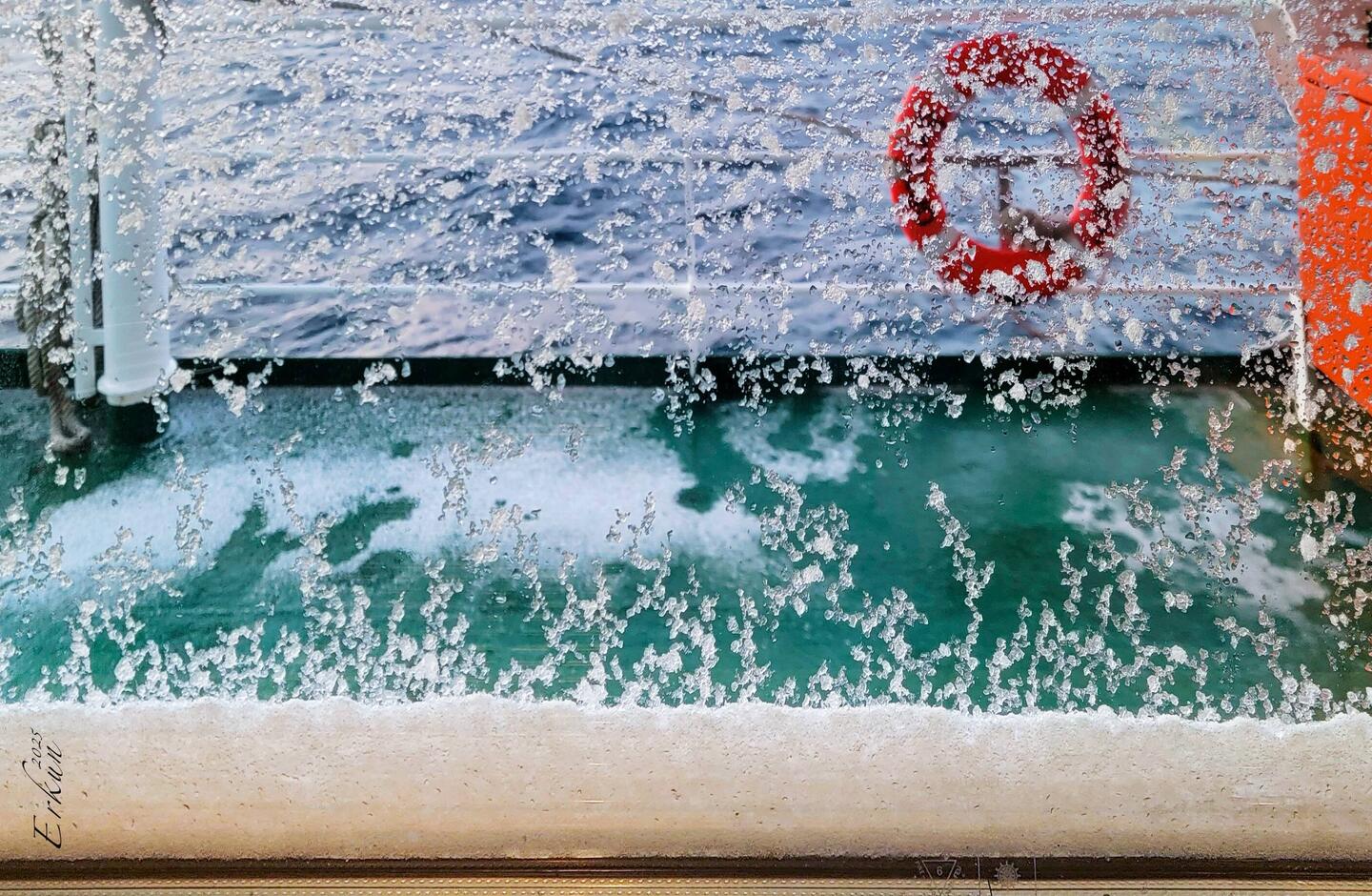 Woke up to snow on deck — heading south through the Scotia Sea.