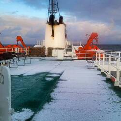 Woke up to snow on deck — heading south through the Scotia Sea.