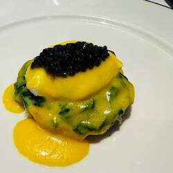 Toasted french brioche, creamy spinach, poached egg, yuzu hollandaise & caviar