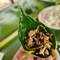 Banana flower salad and chicken lap wrapped in a delicious jungle leaf