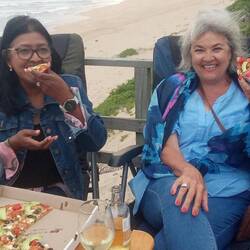 Dianne and Irene tucking into our takeaway pizzas, which had to be finished off at home