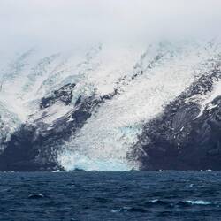 Rivers of ice streaming down the flanks of Mt Hodson — Visokoi Island, South Sandwich Islands.