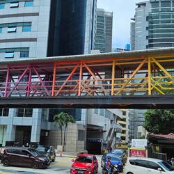 These colorful covered walkways are intended to promote walking and lessen traffic.