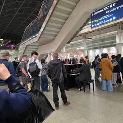 Piano music at King's Cross, a hub for Eurostar trains.