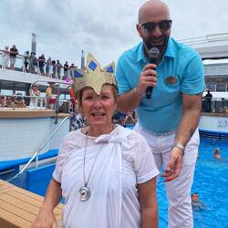 Cruise Director Roberto and the queen