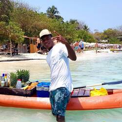 Another bartender and his kayak bar. Rosario Island.