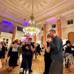 Starting to glide across the floor to captivating music