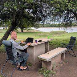 Working on the blog at our cheapest campsite ever! 80 eurocents per person 😎. Hot shower included
