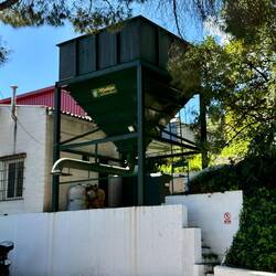 Olive oil mill, complete with conveyor belts to take the olives up to this hopper