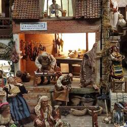 Der Fleischer im Hintergrund.