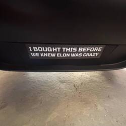 Bumper sticker on April & Brent's Tesla