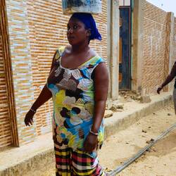 Working woman walking her load