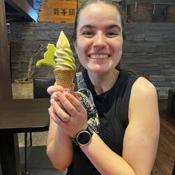 Matcha and milk tea flavored ice cream with a cat cookie