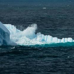 Wave action continues to erode the iceberg — South Sandwich Islands.