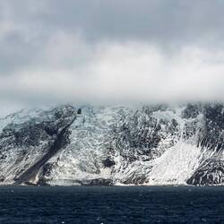 A closer look at the cliffs that surround the shoreline of Cook Island — South Sandwich Islands.