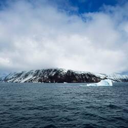 Like most of the SSI islands we've seen, the top of Cook Island is enveloped in clouds — SSI.