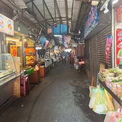 Covered street market that looks like it would be really sketchy but is actually very safe (daytime)