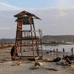 Public beach in Puerto Colombia. Many people enjoy a simple way of life...