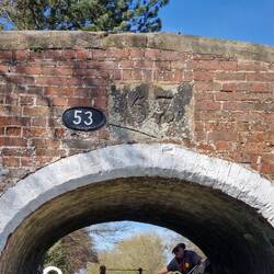 The old bridge number preserved next to the new