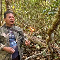 Osmar making a bush torch