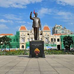 Uncle Ho with city hall behind him.