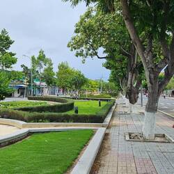 DJ walking down the boulevard median in Cam Ranh.