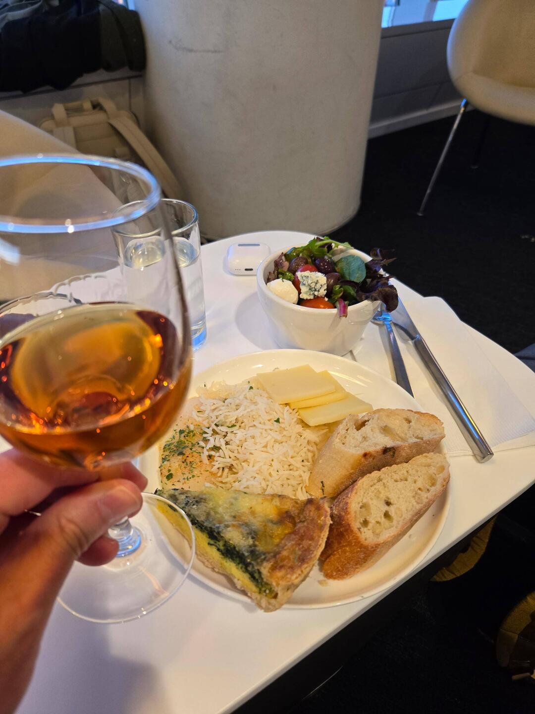 Cognac and snacks in the JFK Air France lounge 30 hours after leaving home