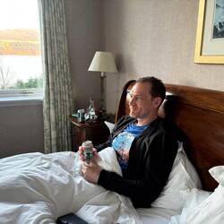 Charlie has his free beer in bed !