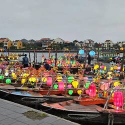 Boats adorned with lanterns on the lake in Hoi An.