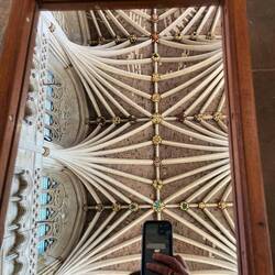 A mirror on a trolley to look up to the ceiling