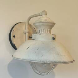 Reusing an exterior sconce inside.