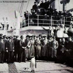 Archive photo of the Neuscwabenland crew with one of the penguins they brought back to Europe.