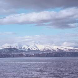 The snowy mountains on our sail into Otaru.