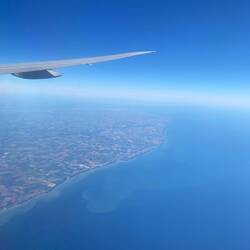 We fly over the Normandy Coast of France