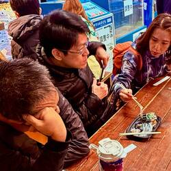 Enjoying the freshest squid!