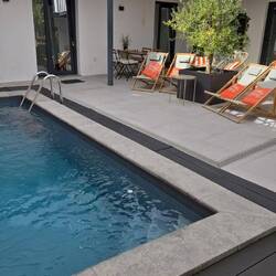 Our stay in Valada. Our room is behind the two red chairs in the far right of the pic.