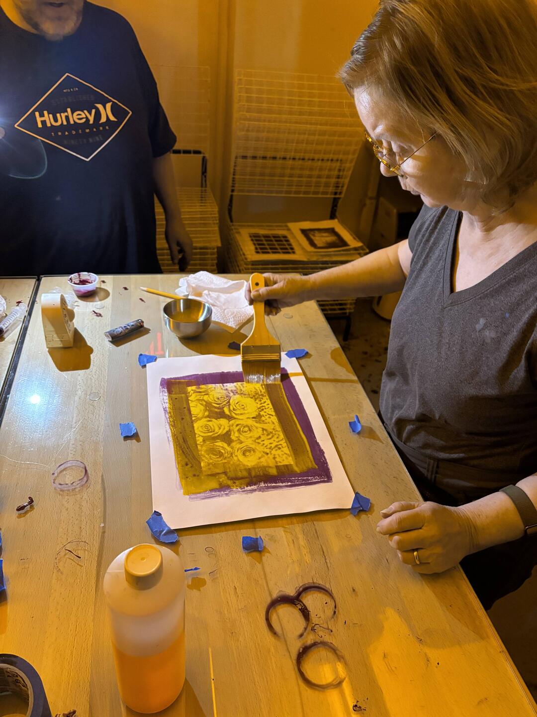 Susanne putting on her second layer (Yellow over Magenta).