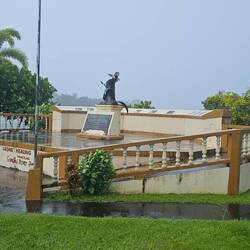 Our chance of rain turned into a downpour as we approached the 2009 tsunami memorial.