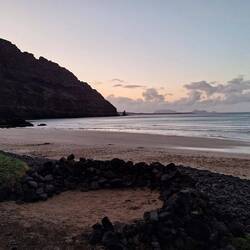 This would be the perfect campsite...a wall has already been built with stones against the wind....