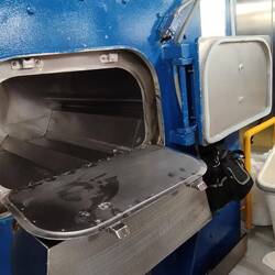 This I a washing machine with 3 compartments each taking 65kg