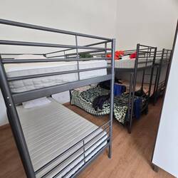 My bunk is the one against the wall