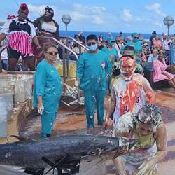 There were lots of polliwogs amongst the staff this time. Everyone kisses the fish