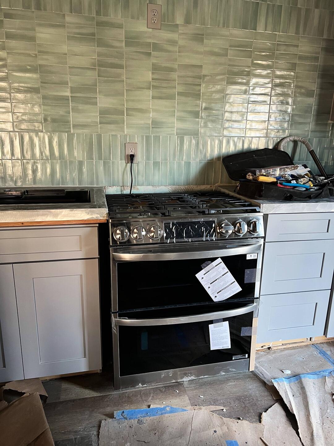 The range needs to be lifted a bit to be level with the countertop. I'm going to love the two ovens