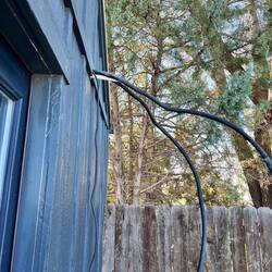 The mini-split hoses coming to exterior.